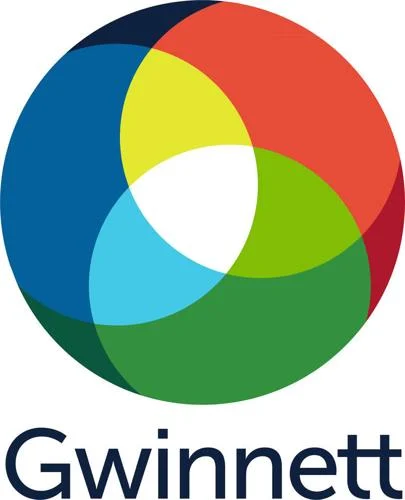 Logo with interlocking colorful circles (red, blue, green, yellow) forming a larger circular shape, symbolizing collaborations, with the text "Gwinnett" underneath in bold.